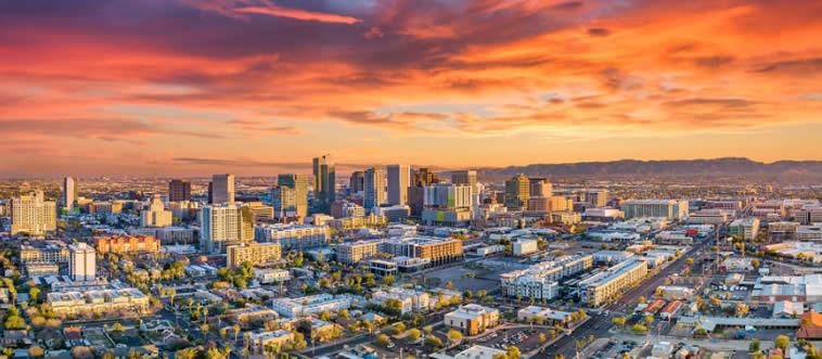 Let's start with a sun-drenched valley. Which state claims the sprawling city of Phoenix as its own?